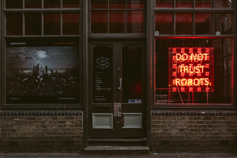 Don't trust robots neon sign